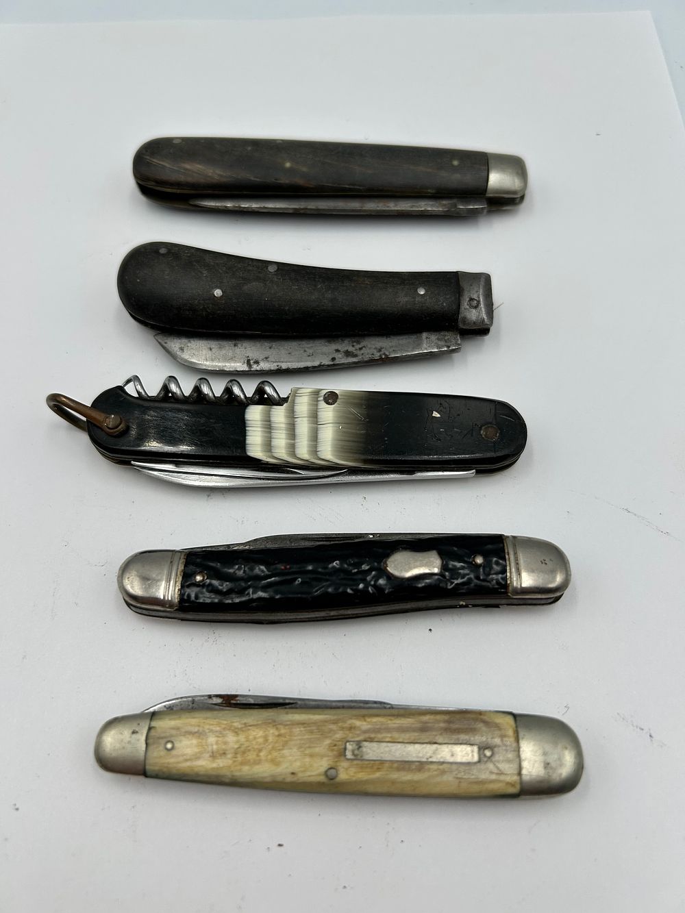 Lot 238: A Collection of Vintage European Style Folding Pocket Knives
