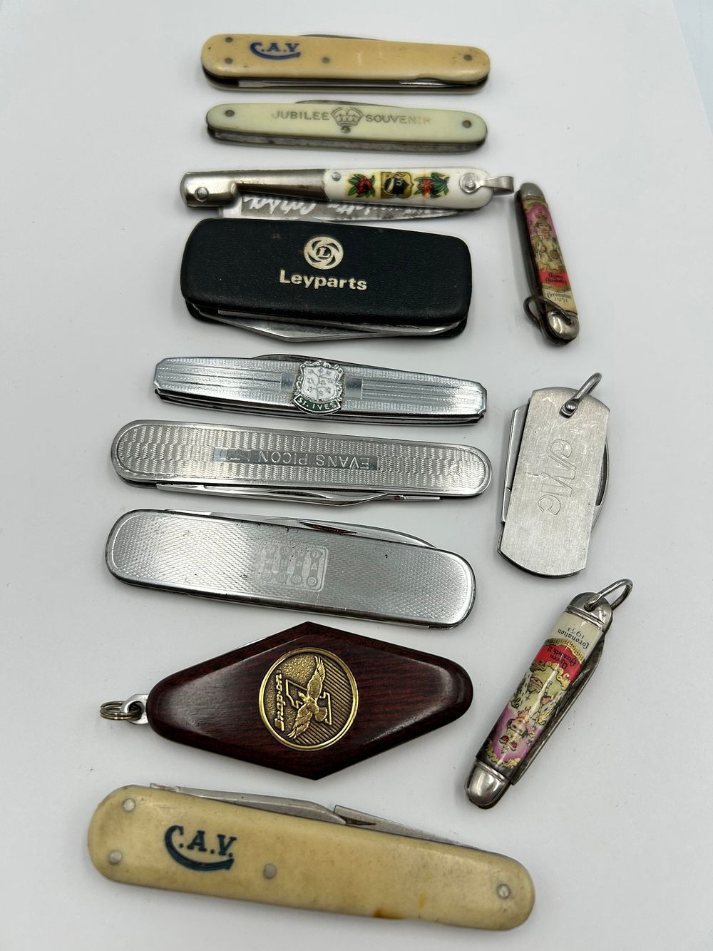 Lot 244: A Collection of Vintage Commemorative and Advertising Pocket Knives and Multi-tools