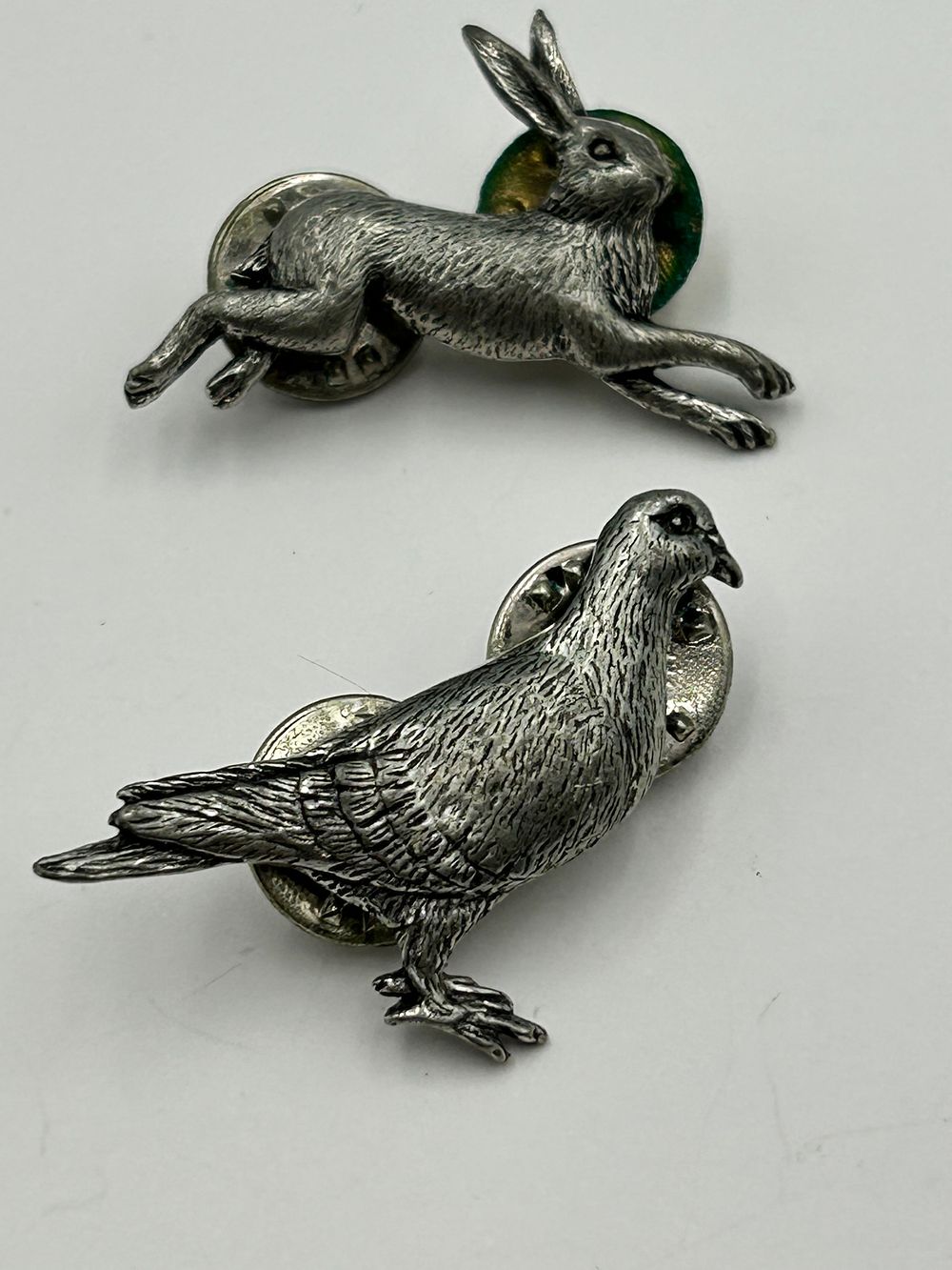 Lot 251: Two A. R. Paget? White Metal Wildlife Subject Lapel Pins