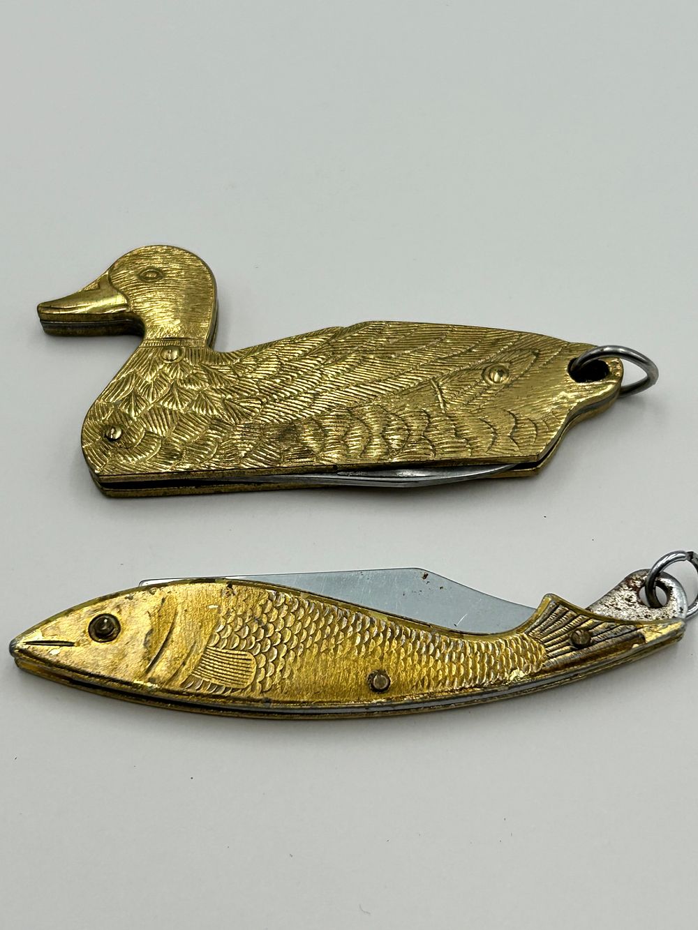 Lot 264: Two Vintage Brass Effect Figural Novelty Pocket Knives