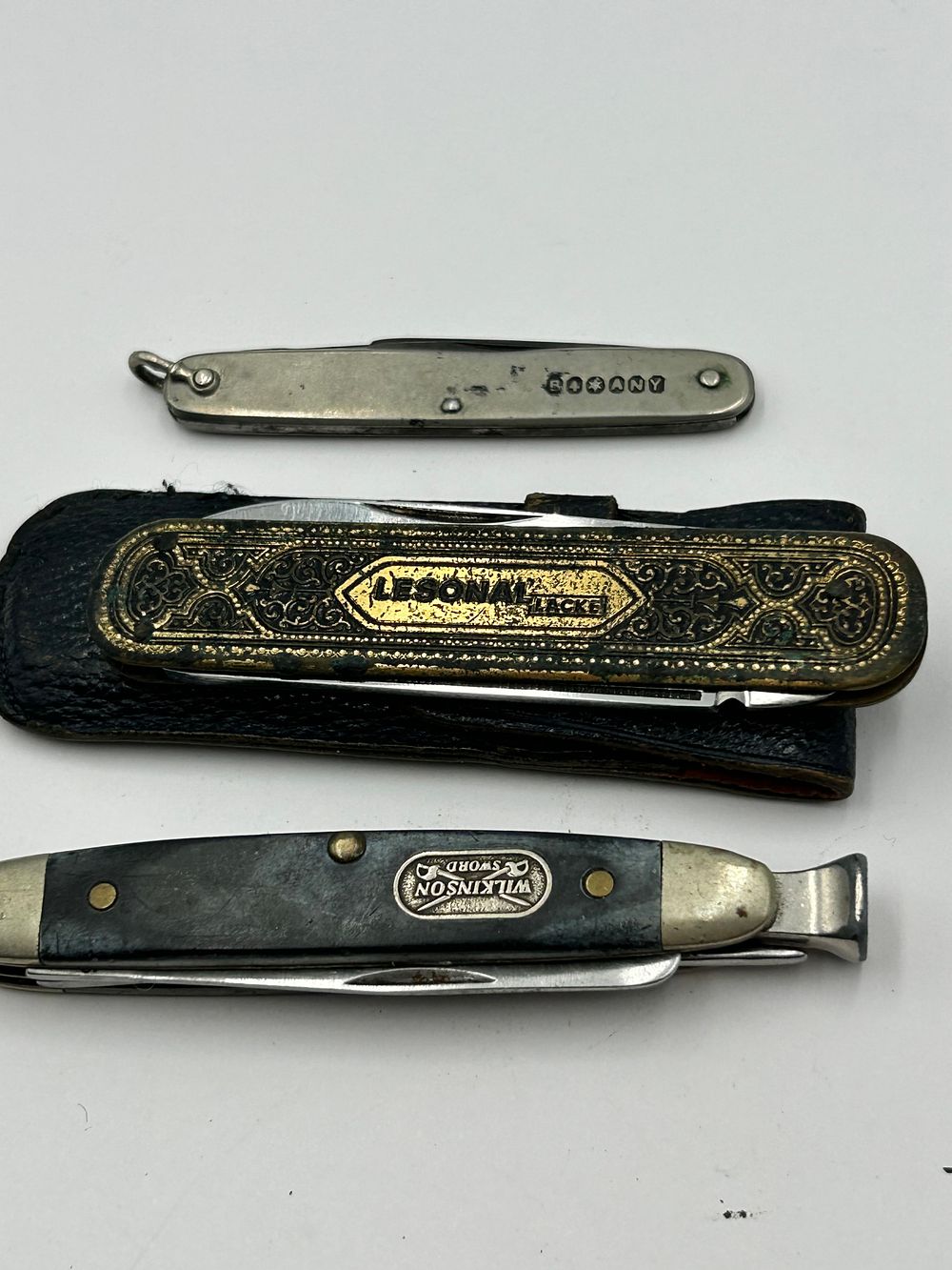 Lot 267: A  Wilkinson Sword? and Advertising Folding Pocket Knives