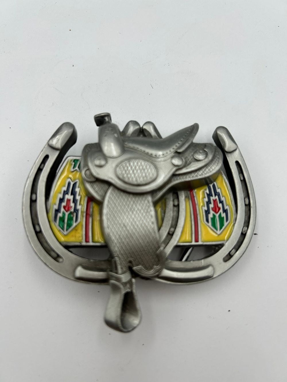 Lot 269: 1980 Western? Cast White Metal and Enamel Horseshoe and Saddle Belt Buckle