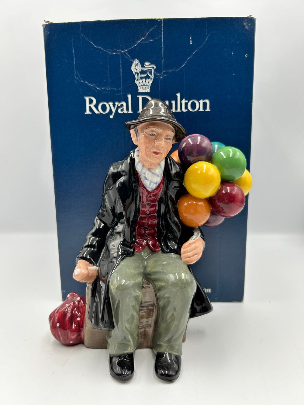 Lot 297: Royal Doulton Porcelain Figurine The Balloon Man HN 1954