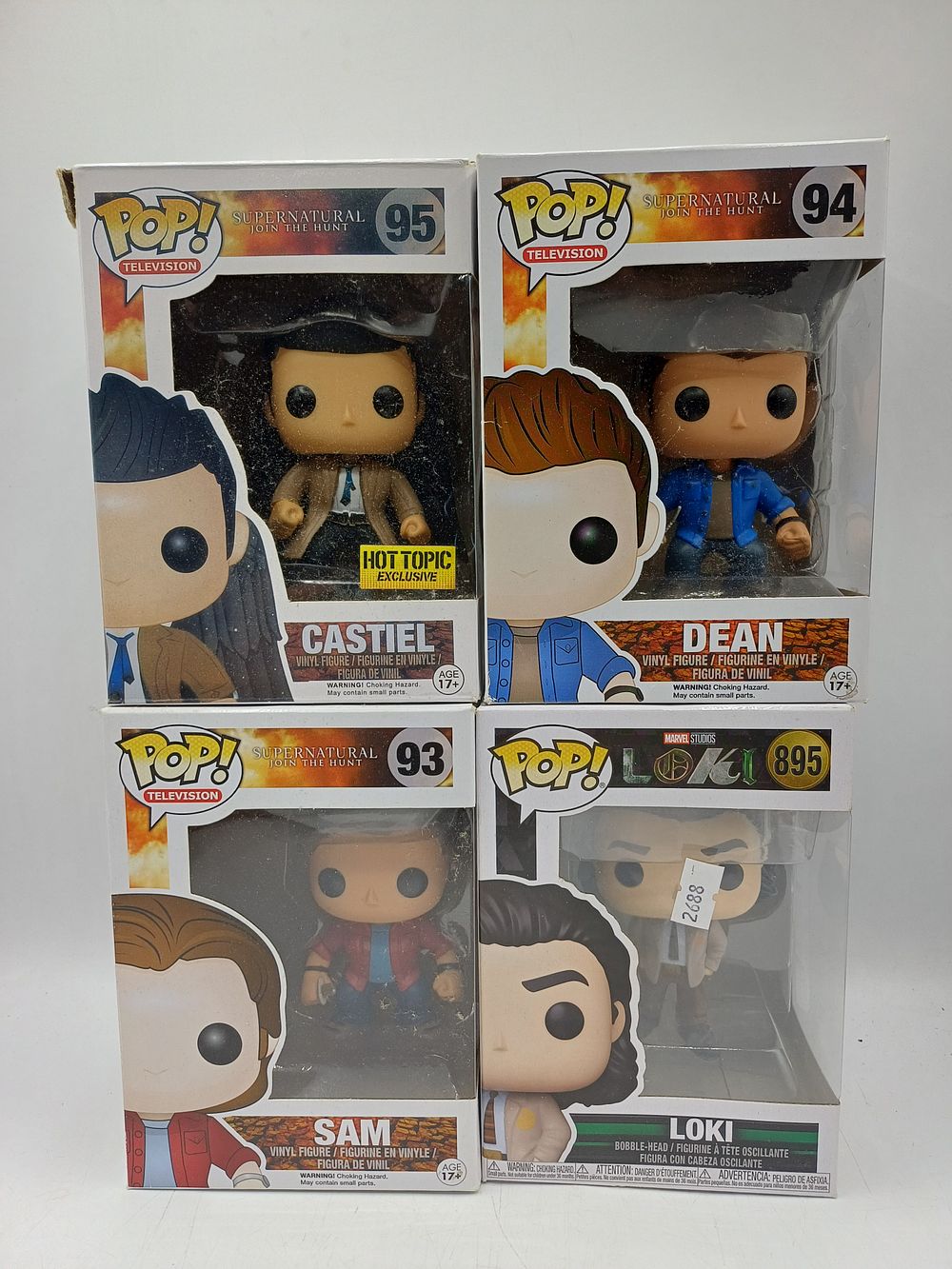Lot 303: A Collection of Funko Pop! Supernatural and Marvel Loki Vinyl Figures