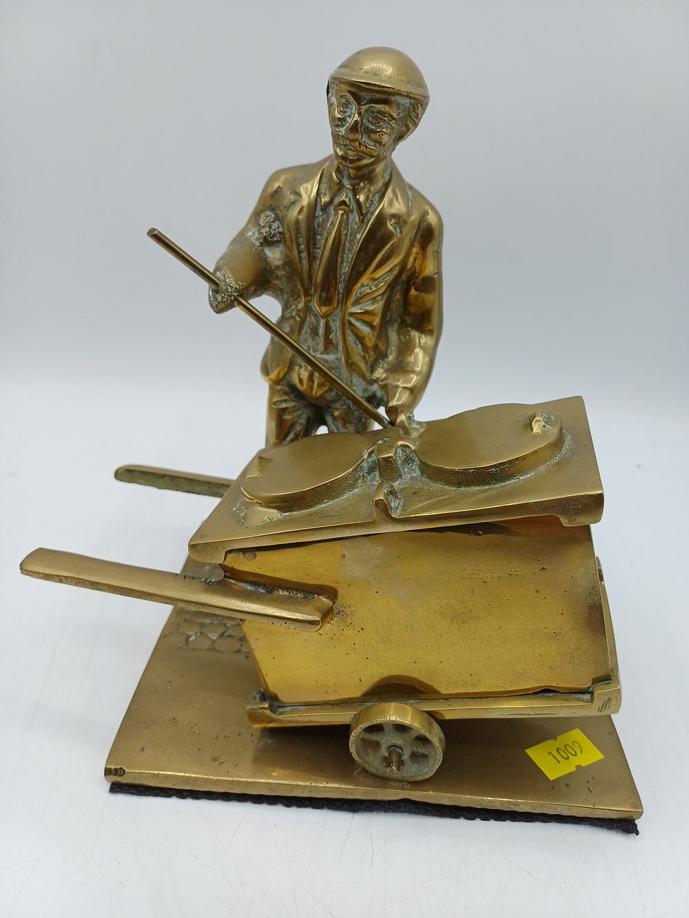 Lot 309: Mid 20th Century Brass Figurative Street Sweeper? Desk Accessory