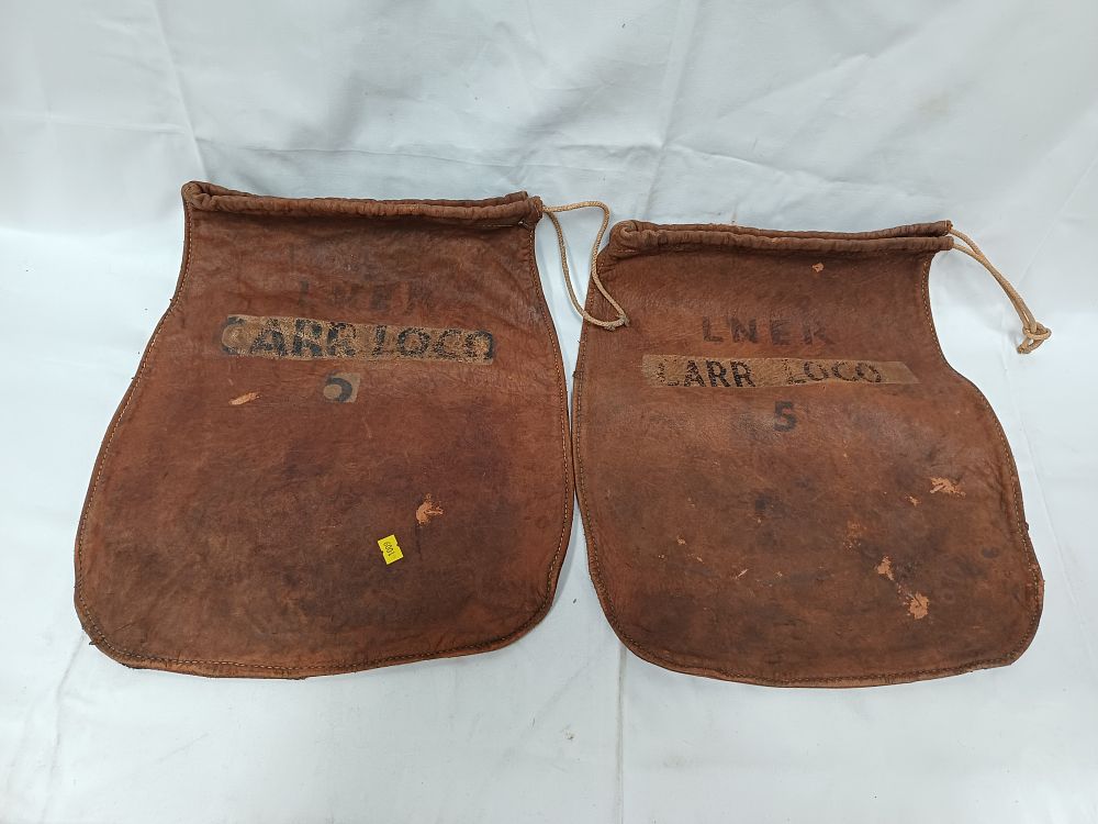 Lot 320: Two LNER Leather CARR LOCO Utility Bags?