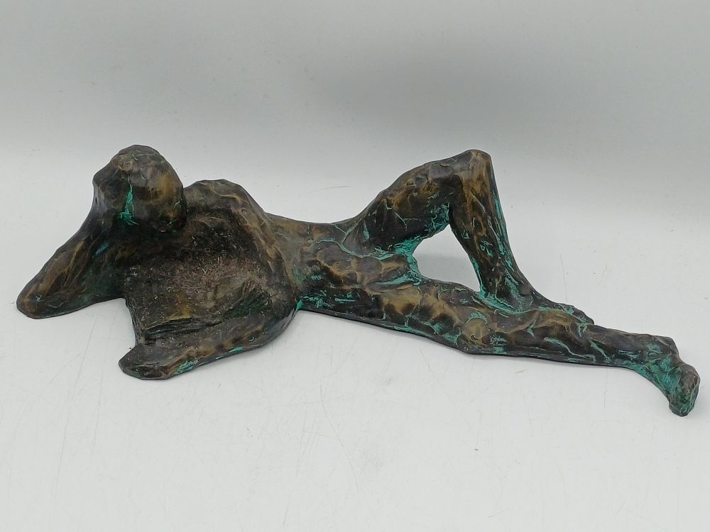 Lot 326: Mid-20th Century Bronzed Reclining Male Figure? Reading a Book
