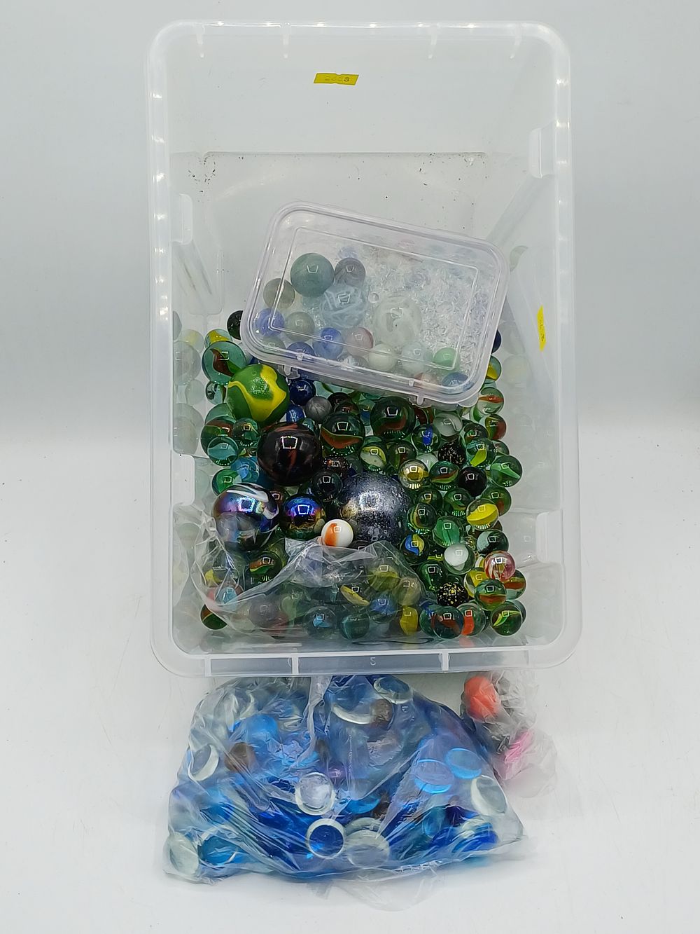 Lot 336: A Collection of Assorted Glass Marbles and Decorative Pebbles