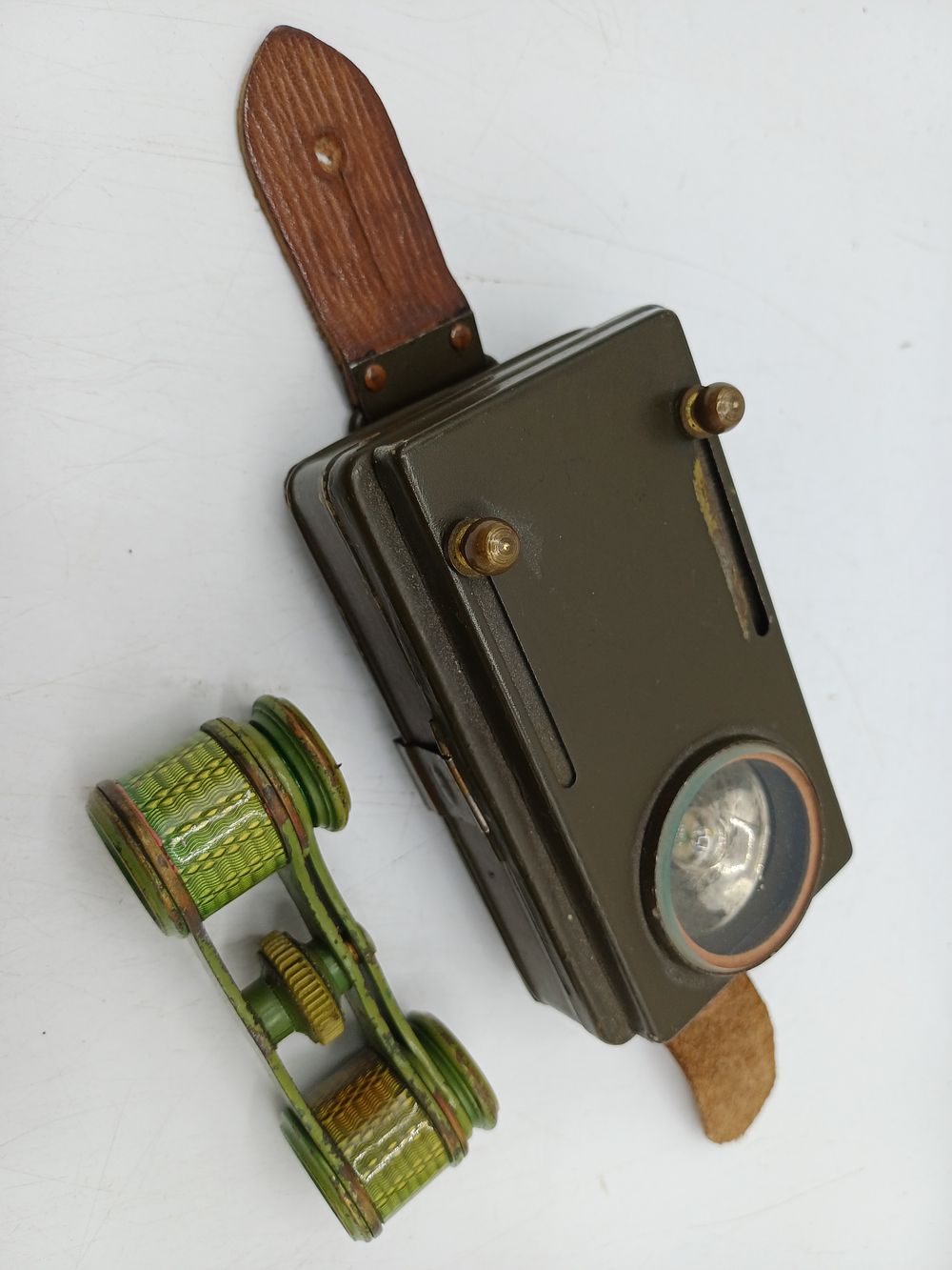 Lot 351: Military Signal Flashlight and Enamelled Brass Miniature Binoculars?