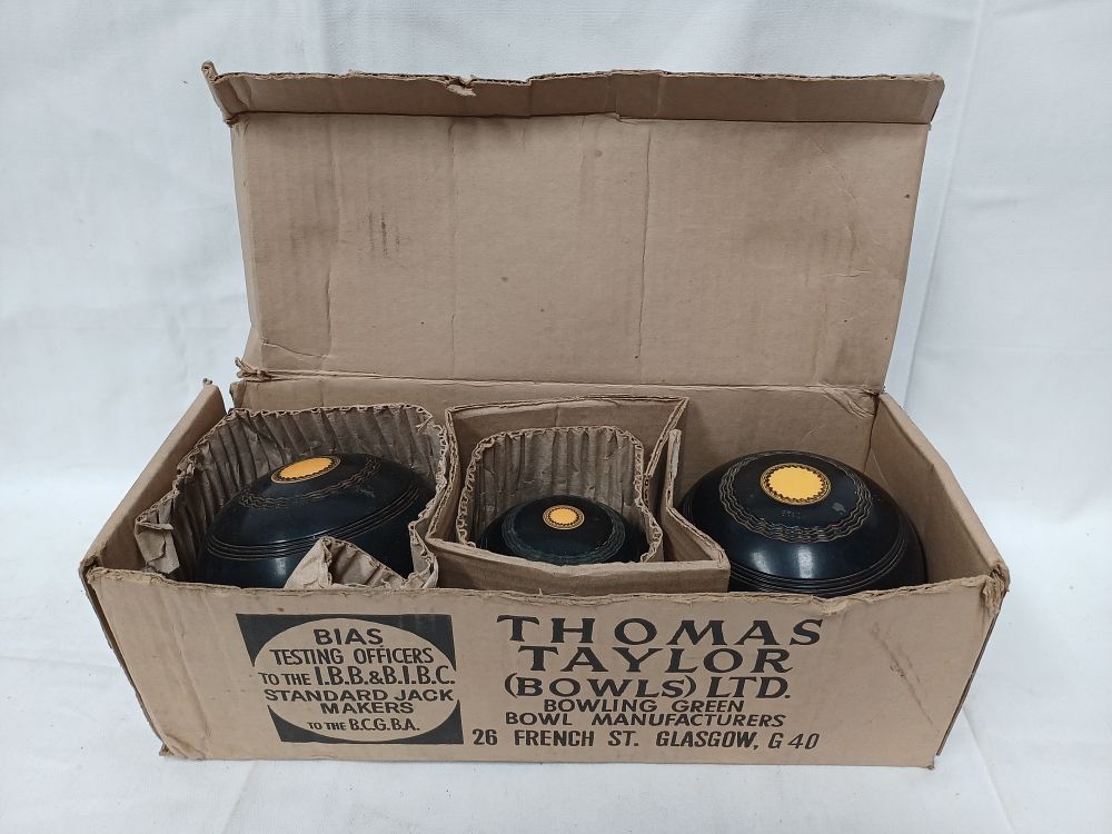 Lot 361: Thomas Taylor (Bowls) Ltd A Trio of Lawn Bowls and Jack