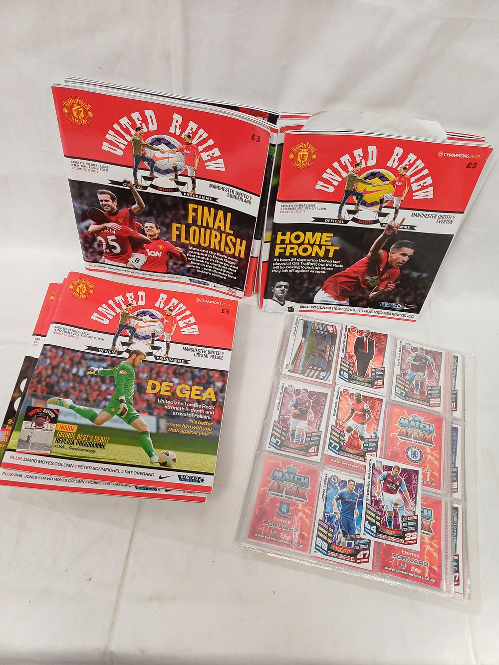 Lot 363: Manchester United Official Matchday Programmes and Topps Match Attax Trading Cards, 2012-2014