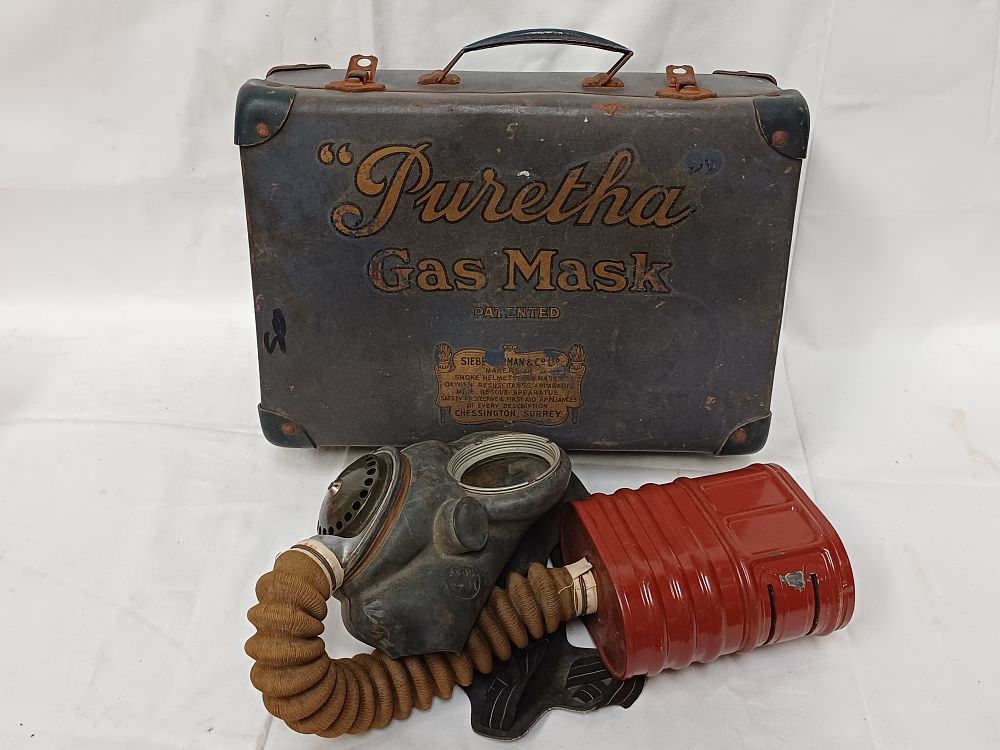 Lot 377: Siebe, Gorman & Co. Ltd Puretha Industrial Gas Mask and Canister, 1941