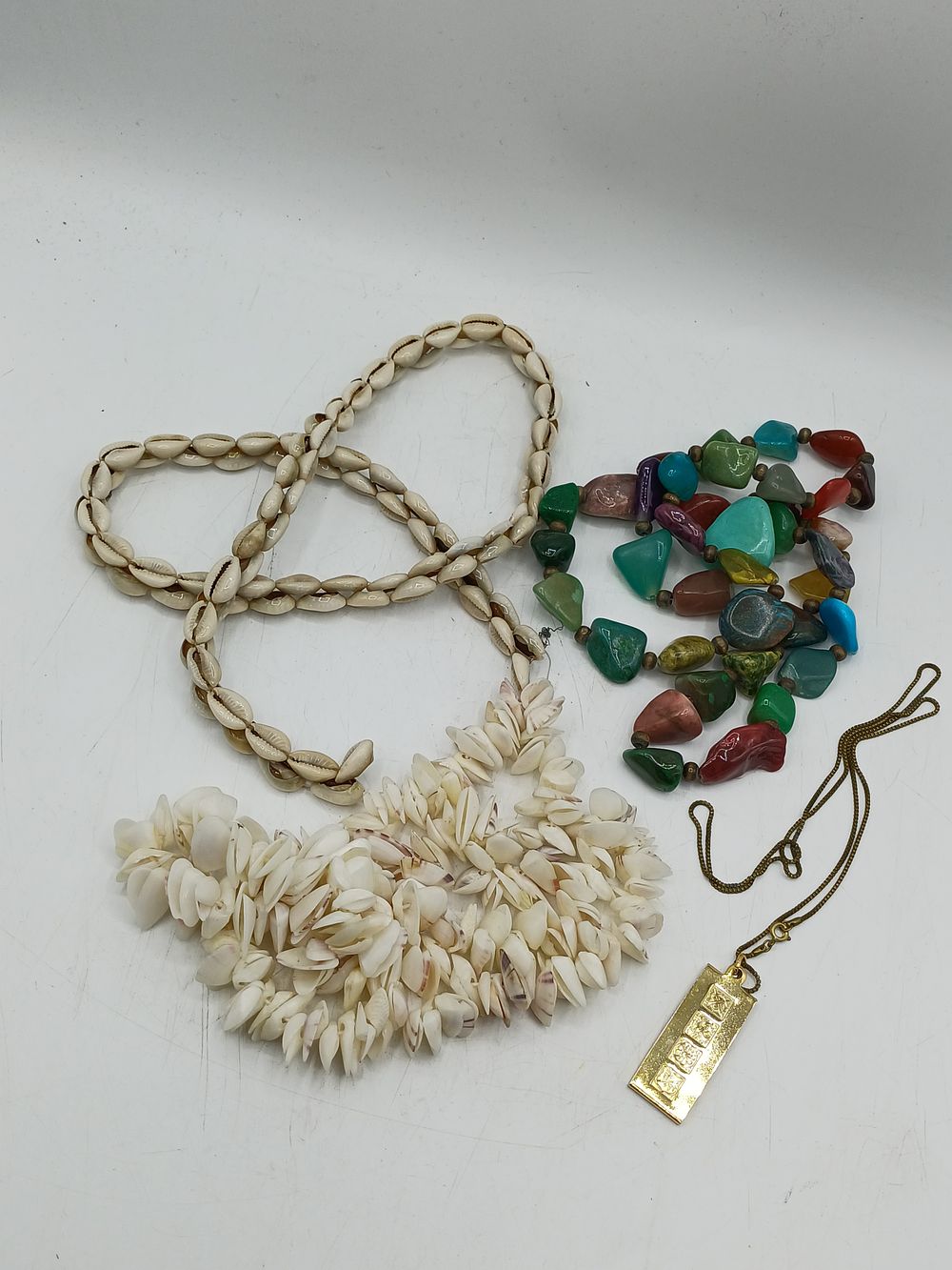Lot 380: A Collection of Shell and Multi-Coloured Semi-Precious? Stone Jewellery