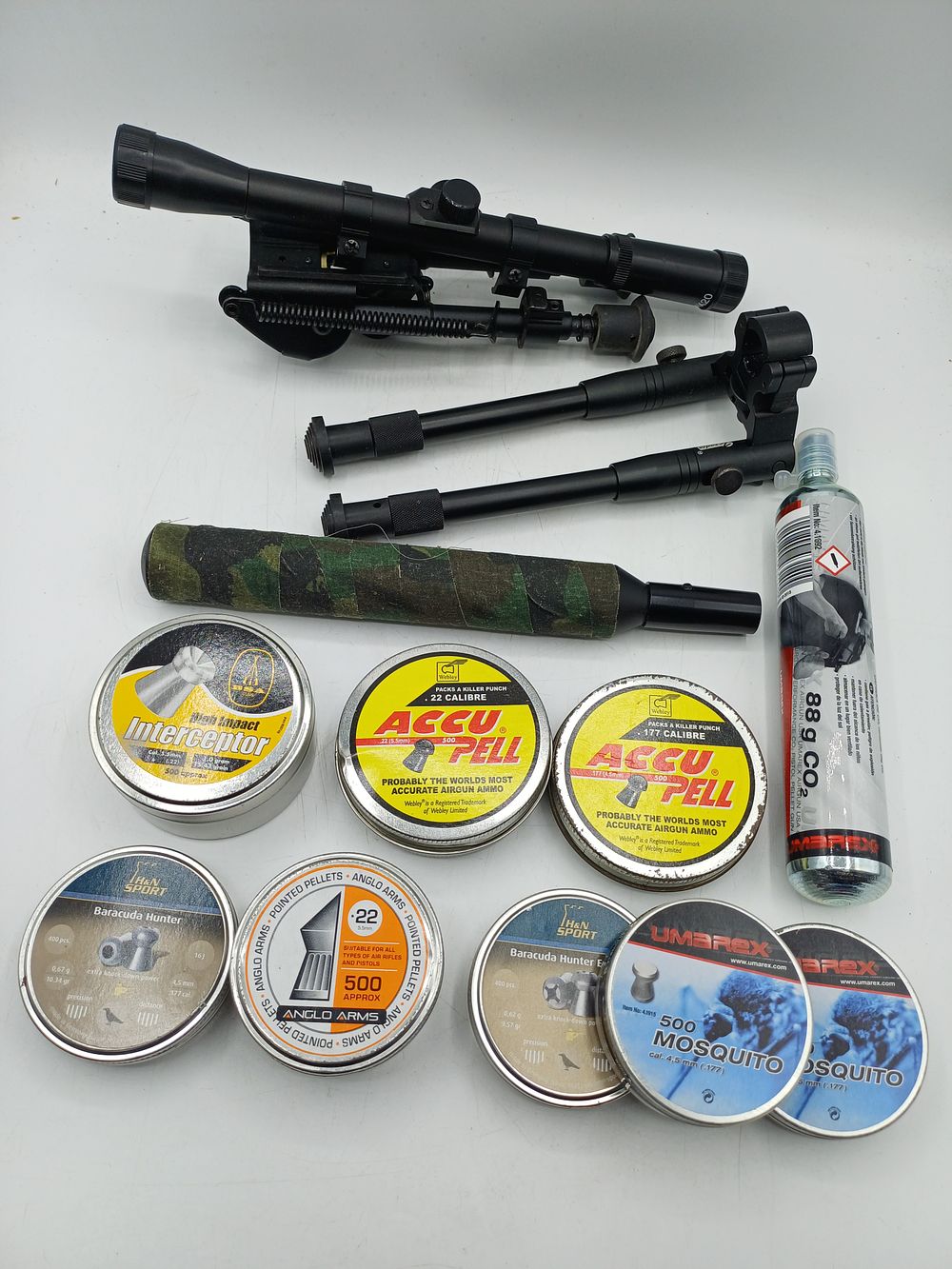 Lot 398: A Collection of Air Rifle Accessories, Optics, Bipods, and Ammunition