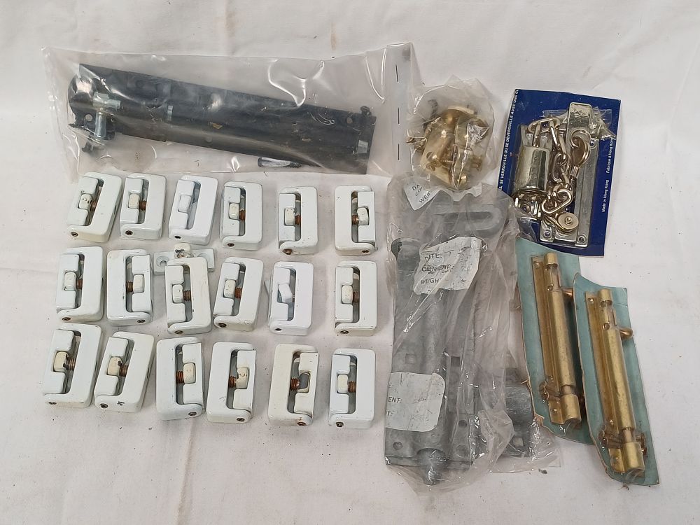 Lot 407: A Collection of Vintage Enameled Window Latches and Architectural Security Hardware