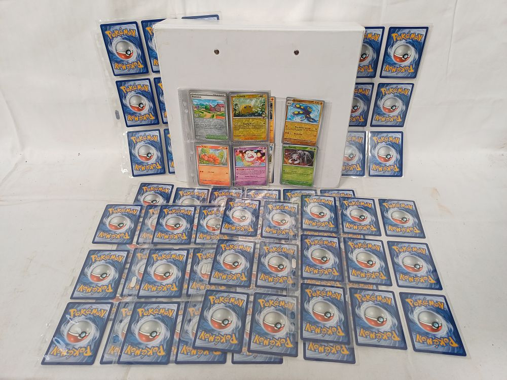 Lot 411: A Collection of Pokémon TCG Modern Era Cards and Binder