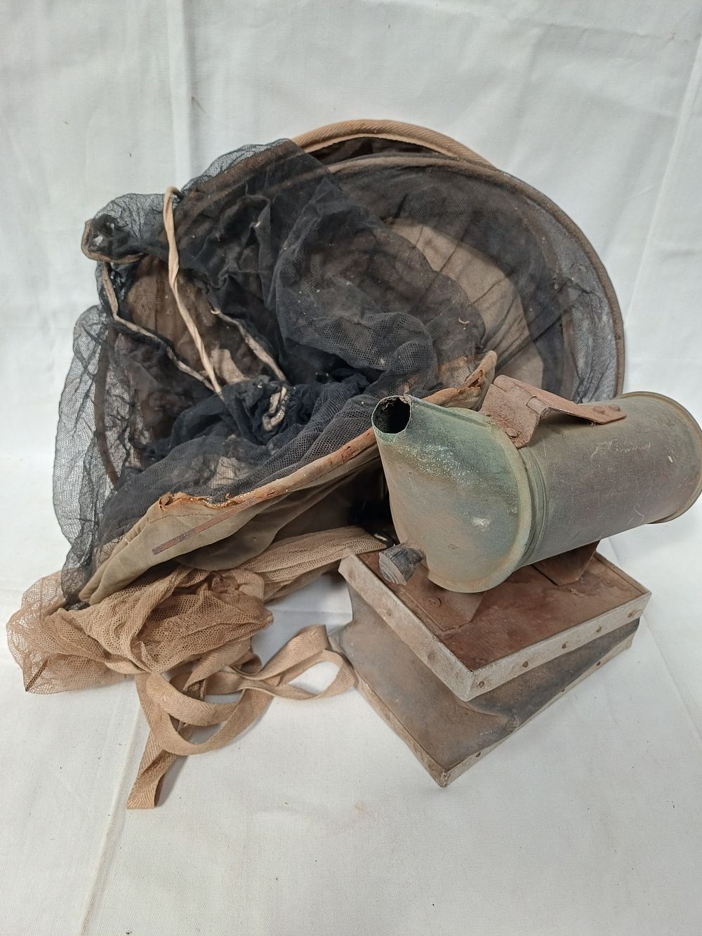 Lot 417: Vintage Metal and Wood Bellows Smoker and Veiled Beekeeping Hats?
