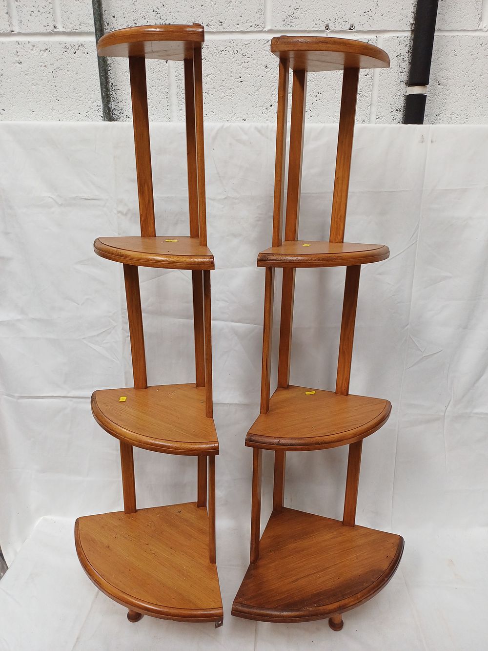 Lot 422: A Pair of Mid-Century Style Wood Corner Etageres, 110cm