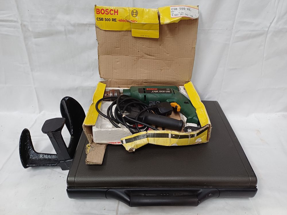 Lot 450: Bosch CSB 500 RE Green Plastic Hammer Drill and Cast Iron Cobbler's Last
