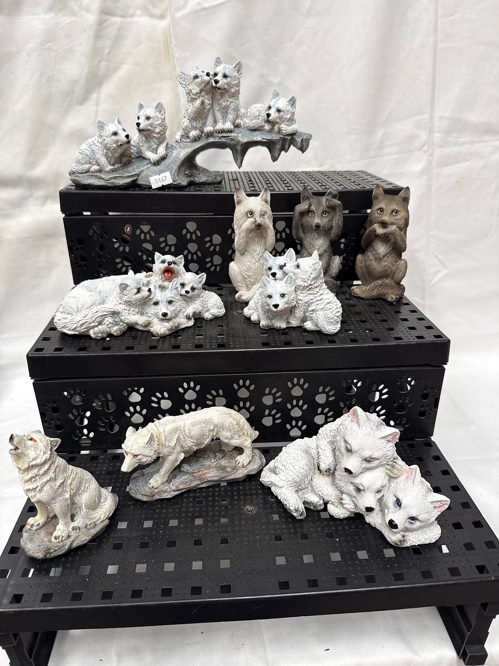 Lot 509: An Assortment of Resin Wolf and Wolf Cub Figurines