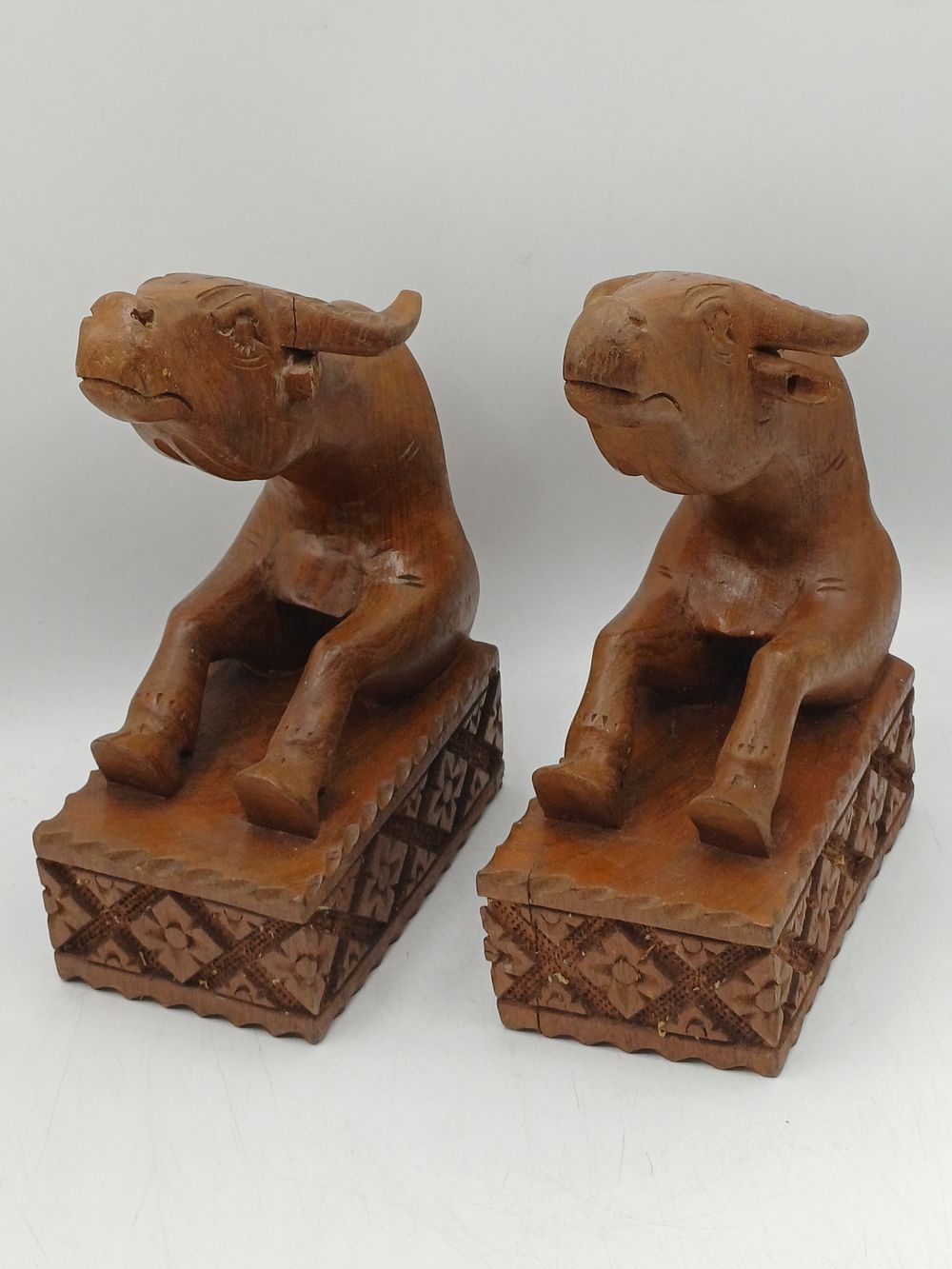 Lot 553: A Pair of Hand-Carved Wooden Water Buffalo Bookends?, 9"