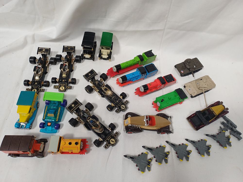 Lot 561: A Collection of Vintage Die-Cast and Plastic Toy Vehicles