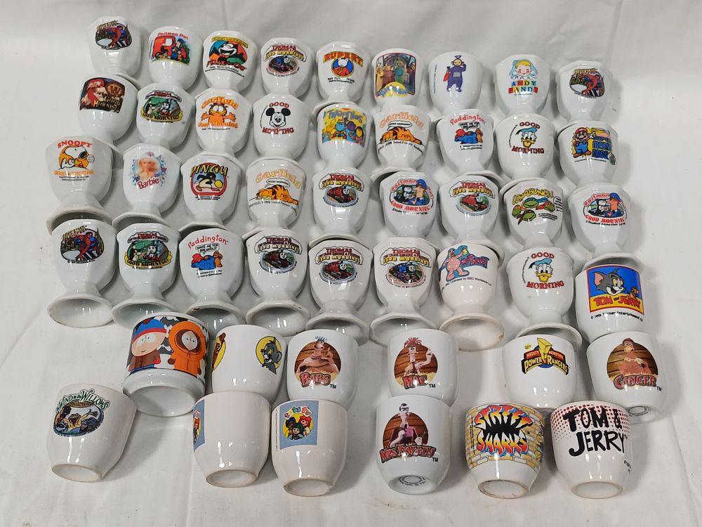 Lot 563: A Collection of Glazed Ceramic Character Egg Cups, Late 20th Century