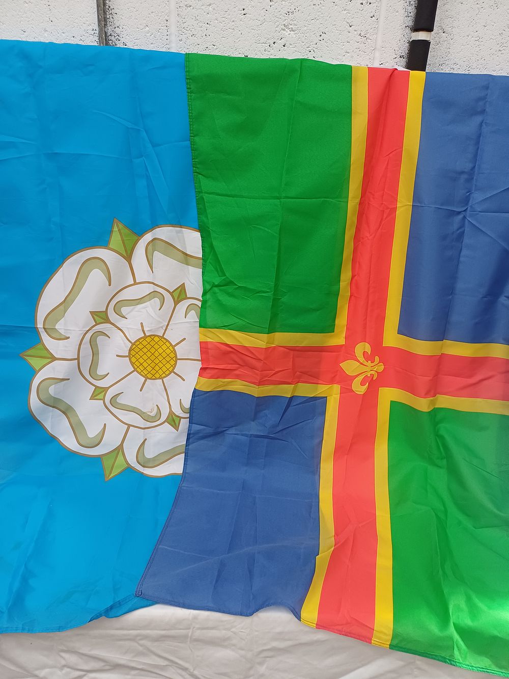 Lot 585: Two Polyester Lincolnshire and Yorkshire East Riding County Flags, 5ft x 3ft