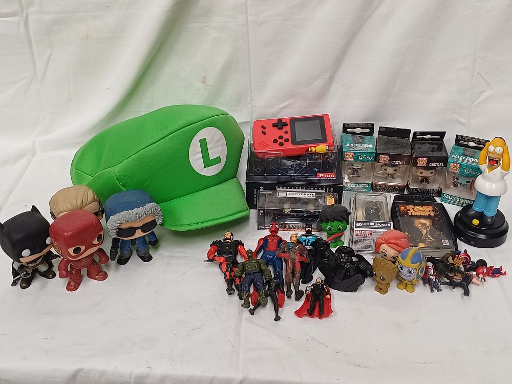 Lot 588: A Collection of Modern Superhero and Pop Culture Collectibles including Funko and Greenlight