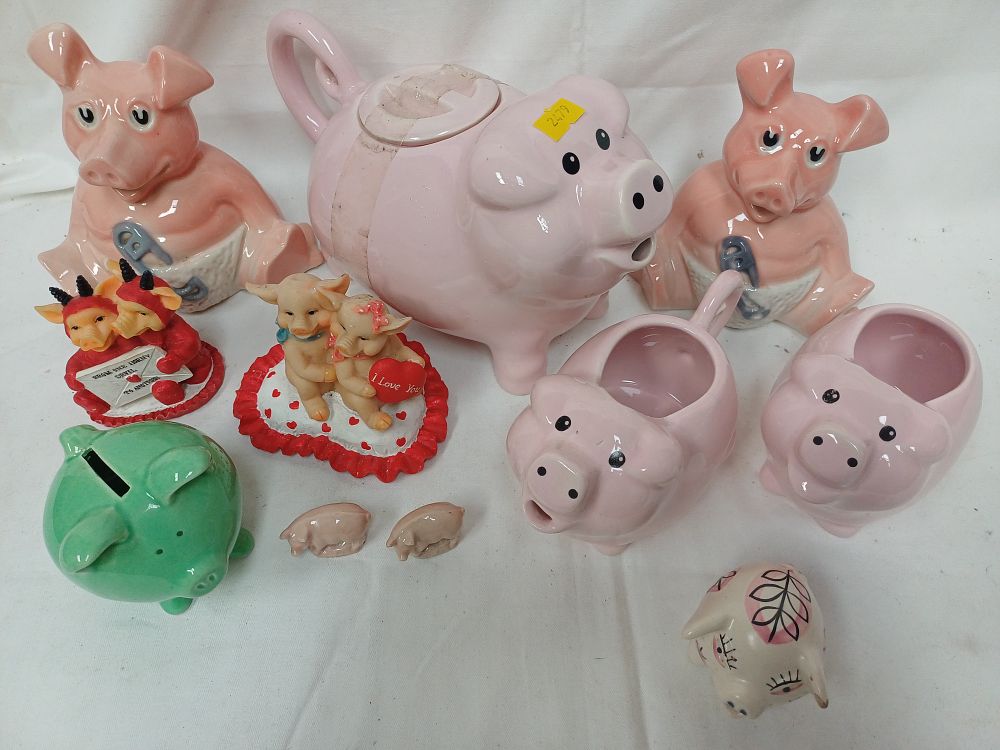 Lot 591: An Assortment of Novelty Glazed Ceramic and Resin Pig Themed Collectables