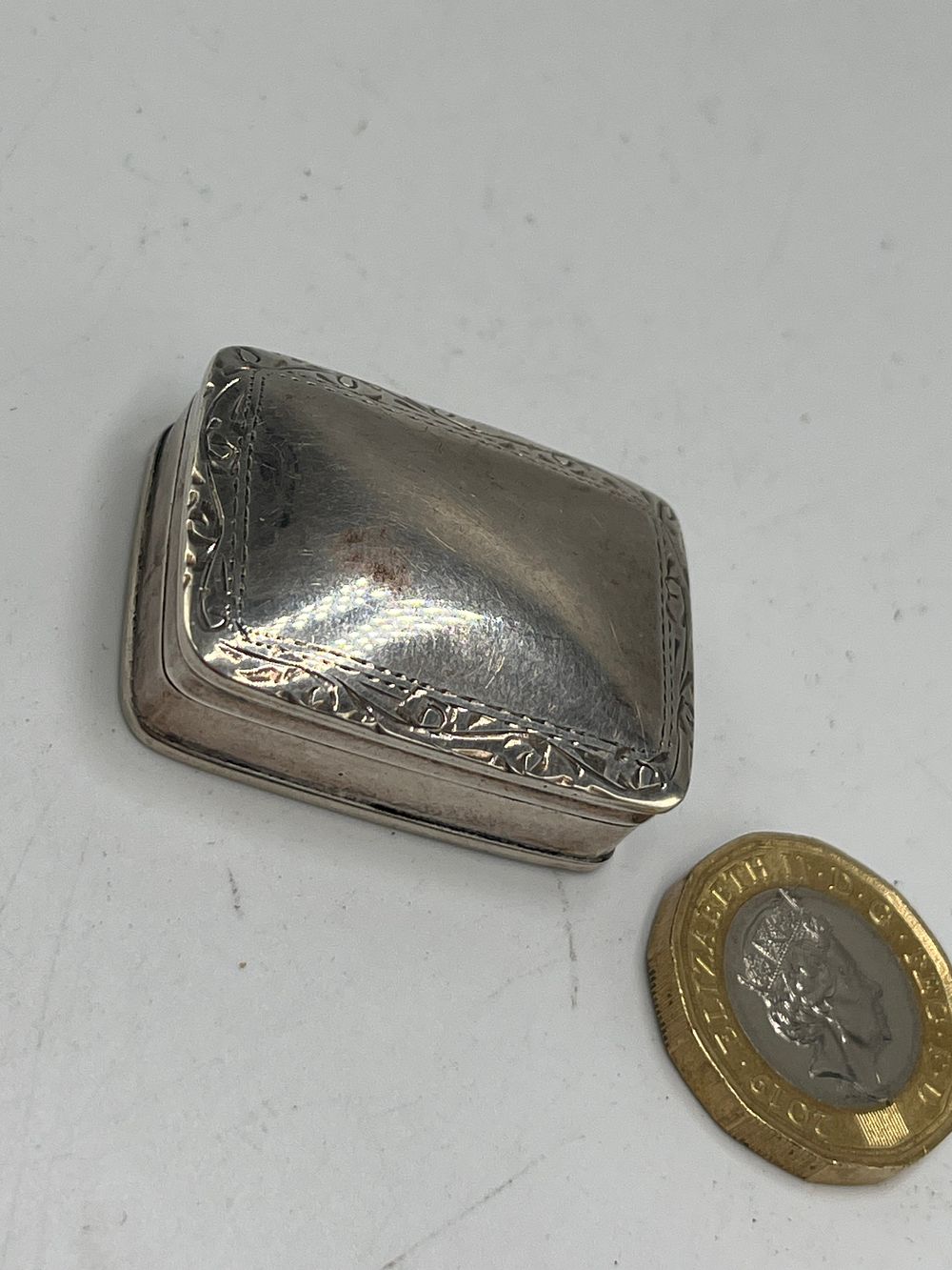 Lot 665: A Sterling Silver Pill Box by CME Jewellery Ltd?, London, 2000, 14g