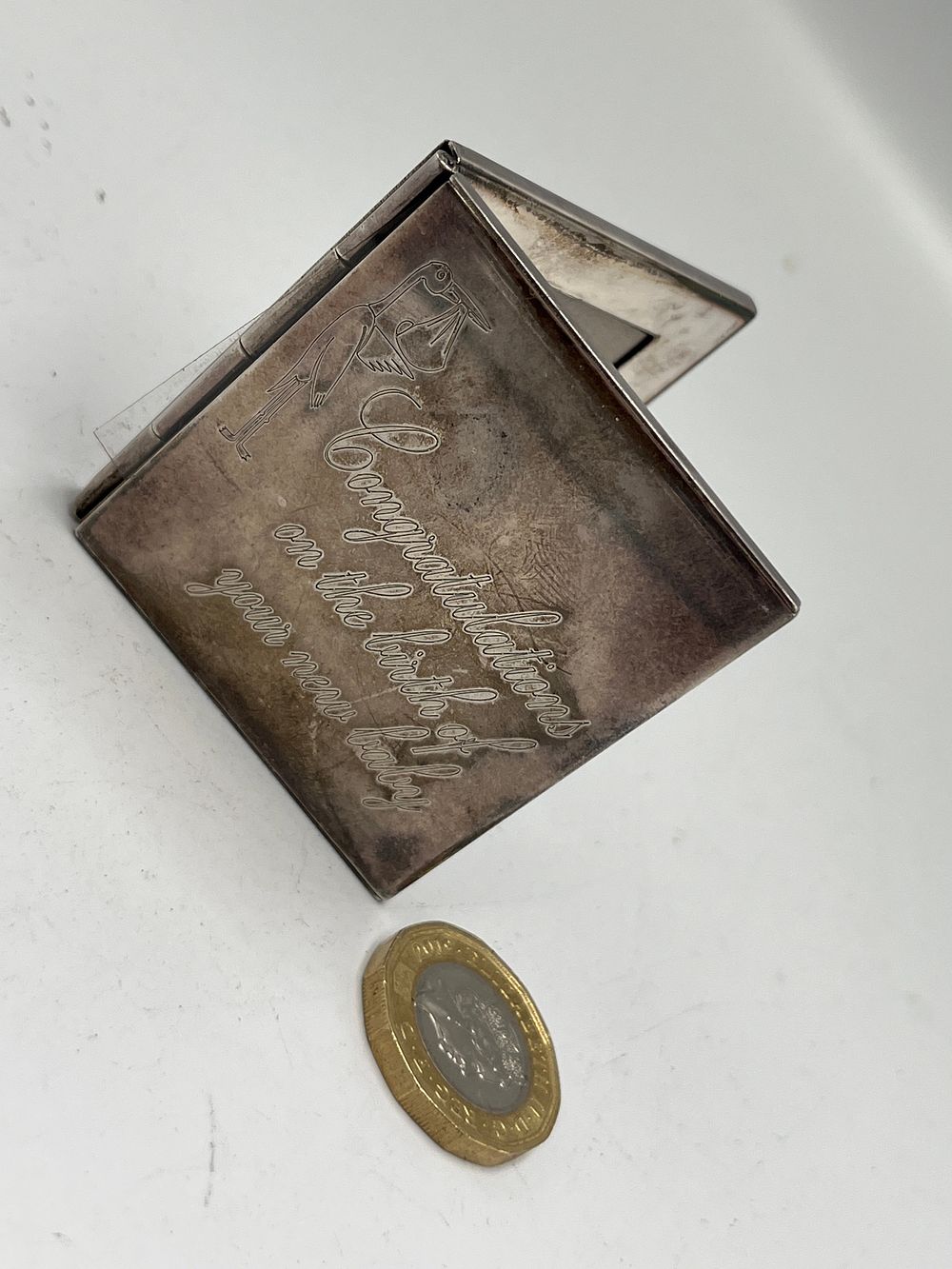 Lot 681: Contemporary Sterling Silver Folding Double Photo Frame by LDW?, Sheffield, 47.52g