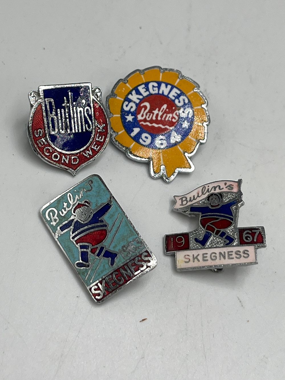Lot 687: A Collection of Skegness Butlin's Enamelled Souvenir Badges, 1964 and 1967