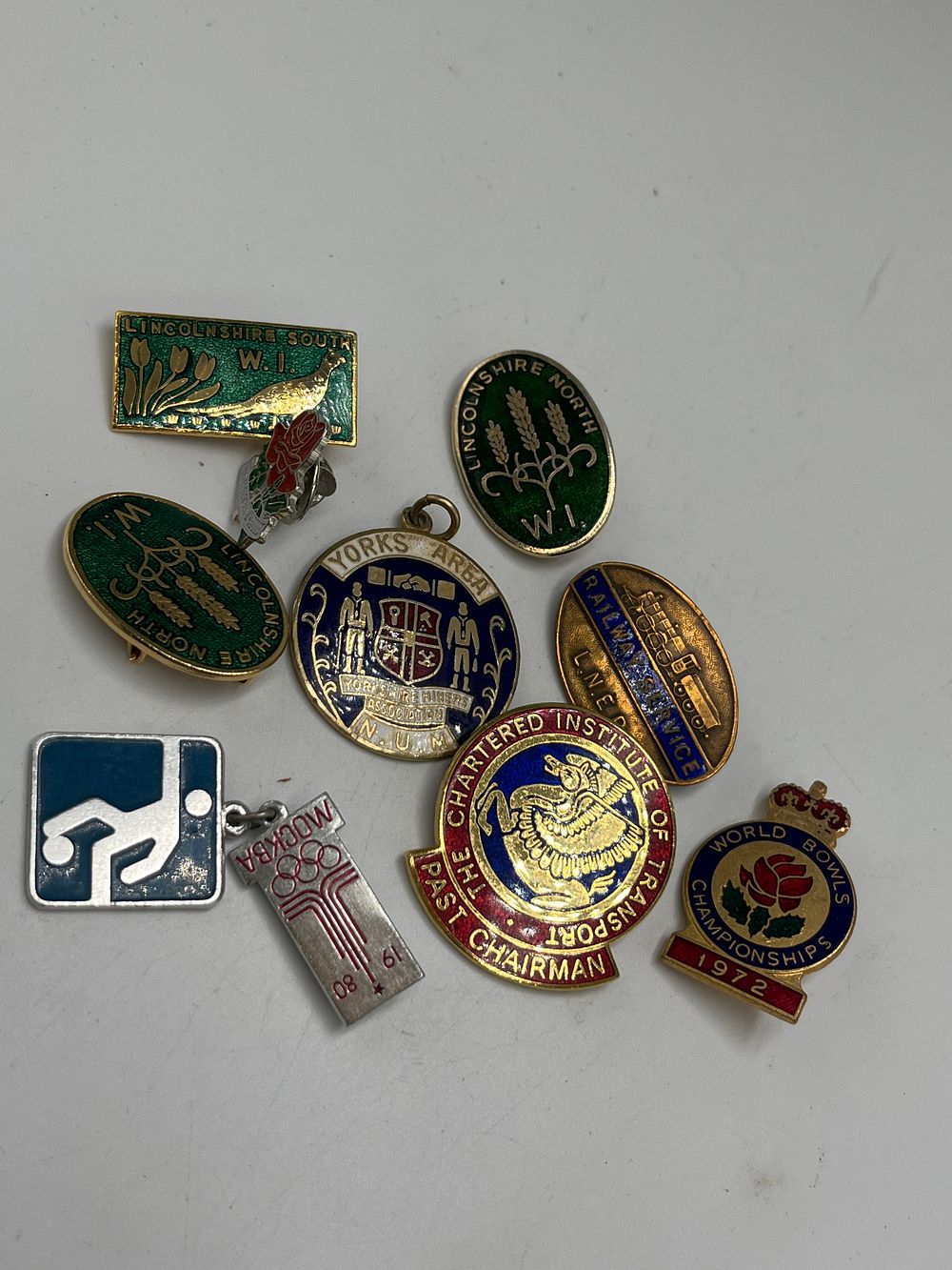 Lot 688: A Collection of British Enamel and White Metal Commemorative Badges and Pendants