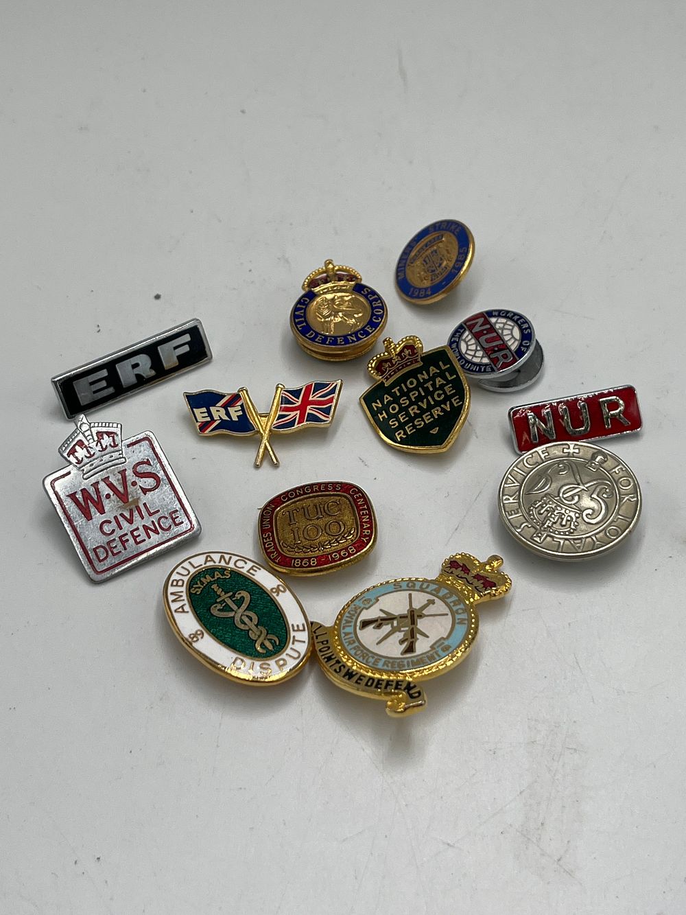 Lot 689: A Collection of British Trade Union, Civil Defence, and Industrial Enamel Badges