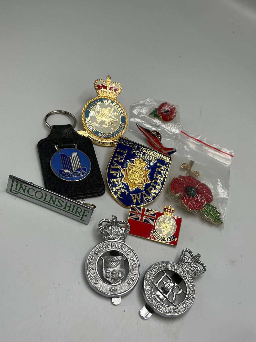Lot 693: A Collection of British Police and Service Related Badges and Memorabilia