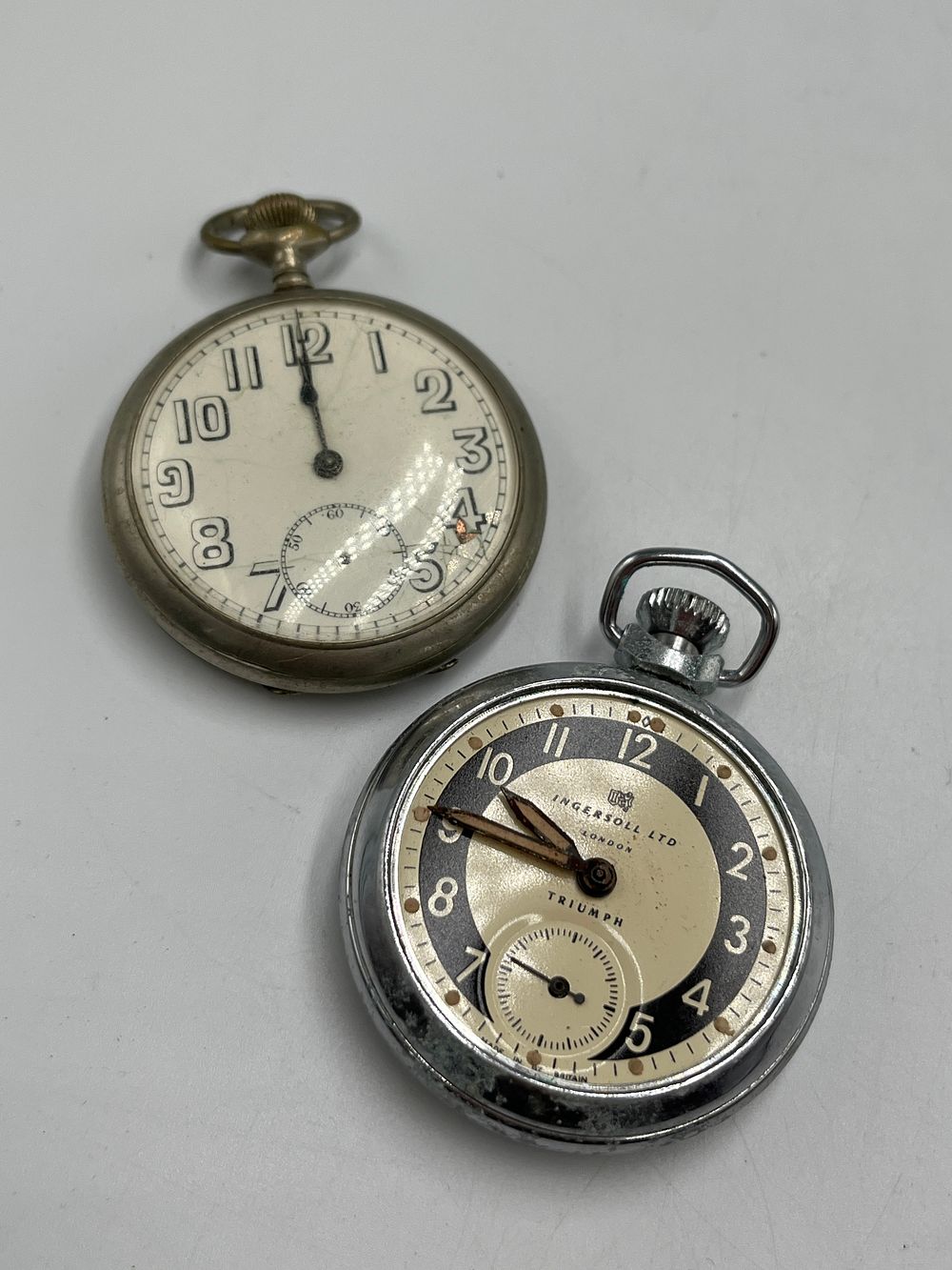 Lot 697: Two White Metal Open Face Pocket Watches including Ingersoll Triumph