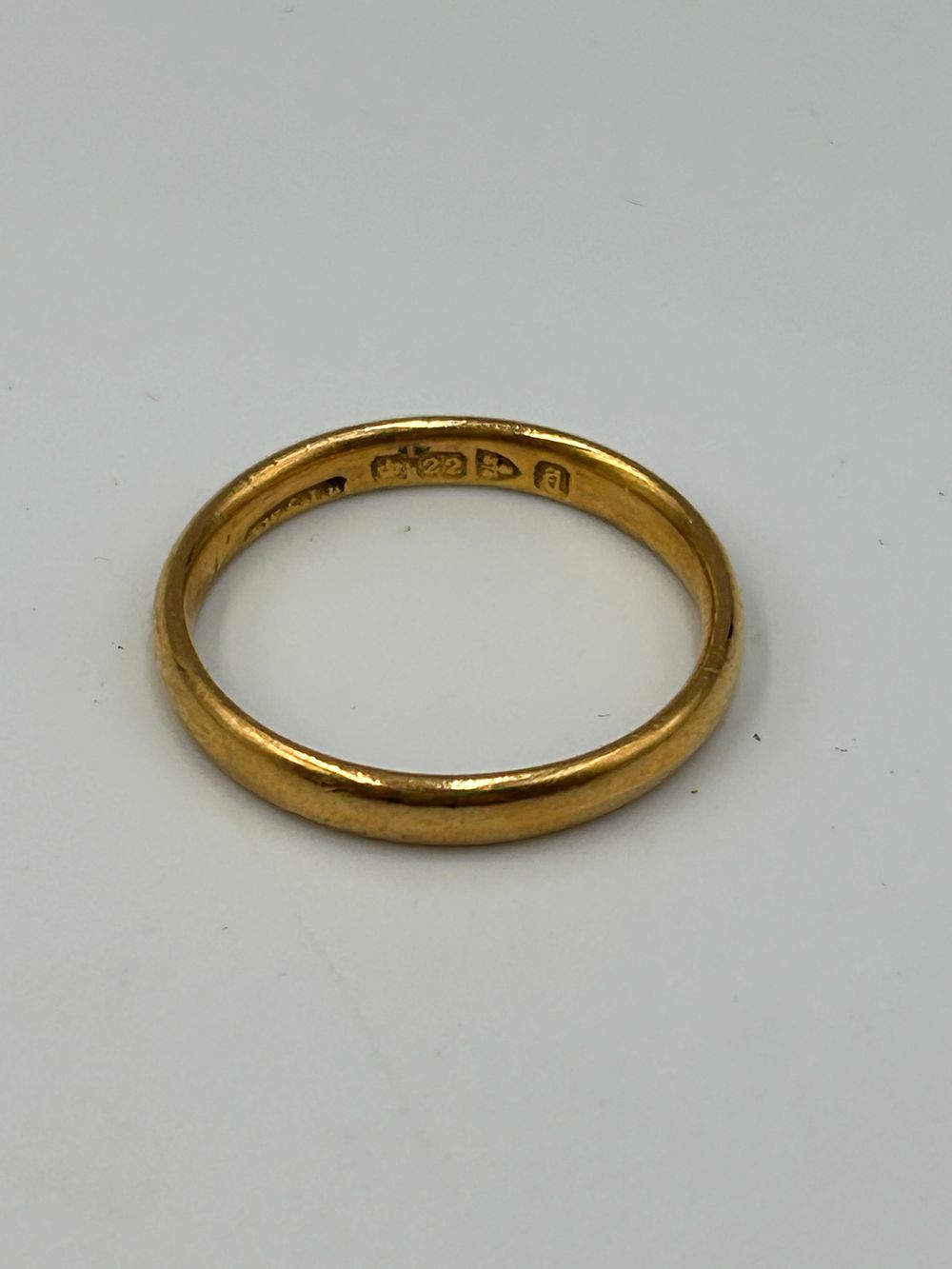 Lot 702: George VI 22 Carat Yellow Gold D-Shaped Wedding Band, London, 1936, 2.94g