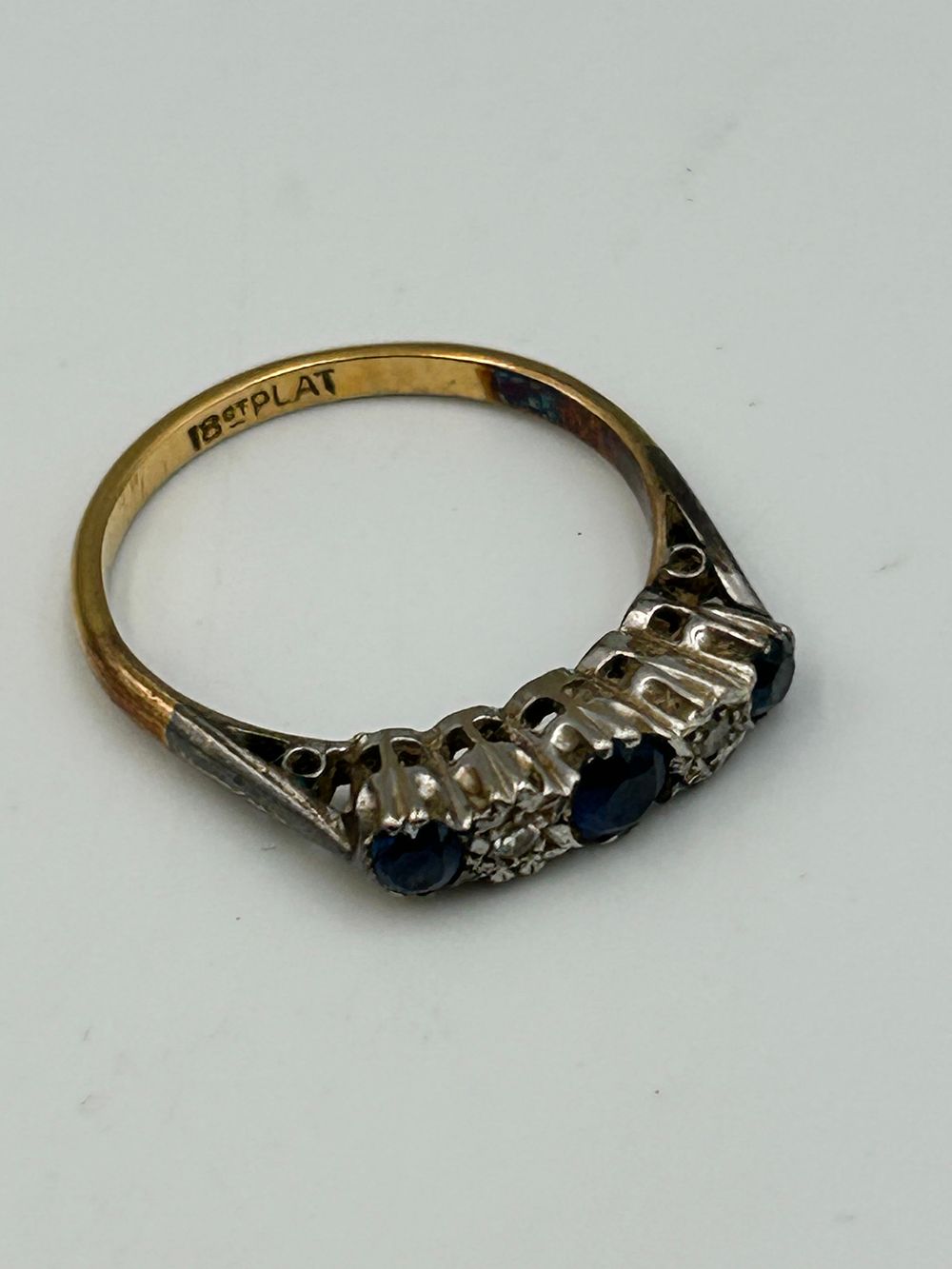 Lot 704: Vintage 18ct Gold and Platinum Sapphire and Diamond Five Stone Ring, 2.49g