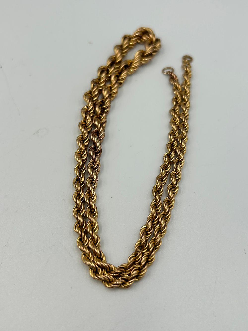 Lot 707: Late Victorian? 9ct Gold Rope Twist Muff Chain, 9g