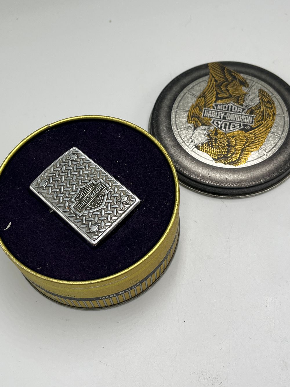 Lot 741: Harley-Davidson Metal Tread Plate Zippo Lighter and Presentation Tin, 2000