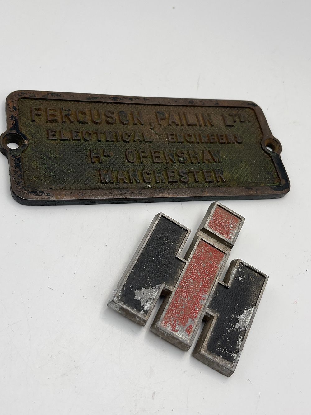 Lot 753: Ferguson, Pailin Ltd and International Harvester Metal Plaques, 7" x 3"