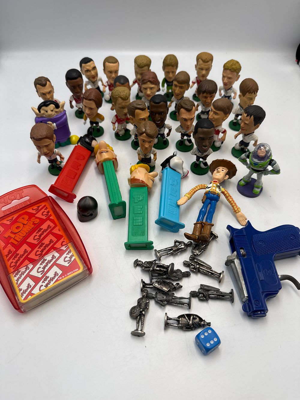 Lot 811: A Collection of ProStars, Pez Dispensers, Toy Story and Historical Style Metal Figures