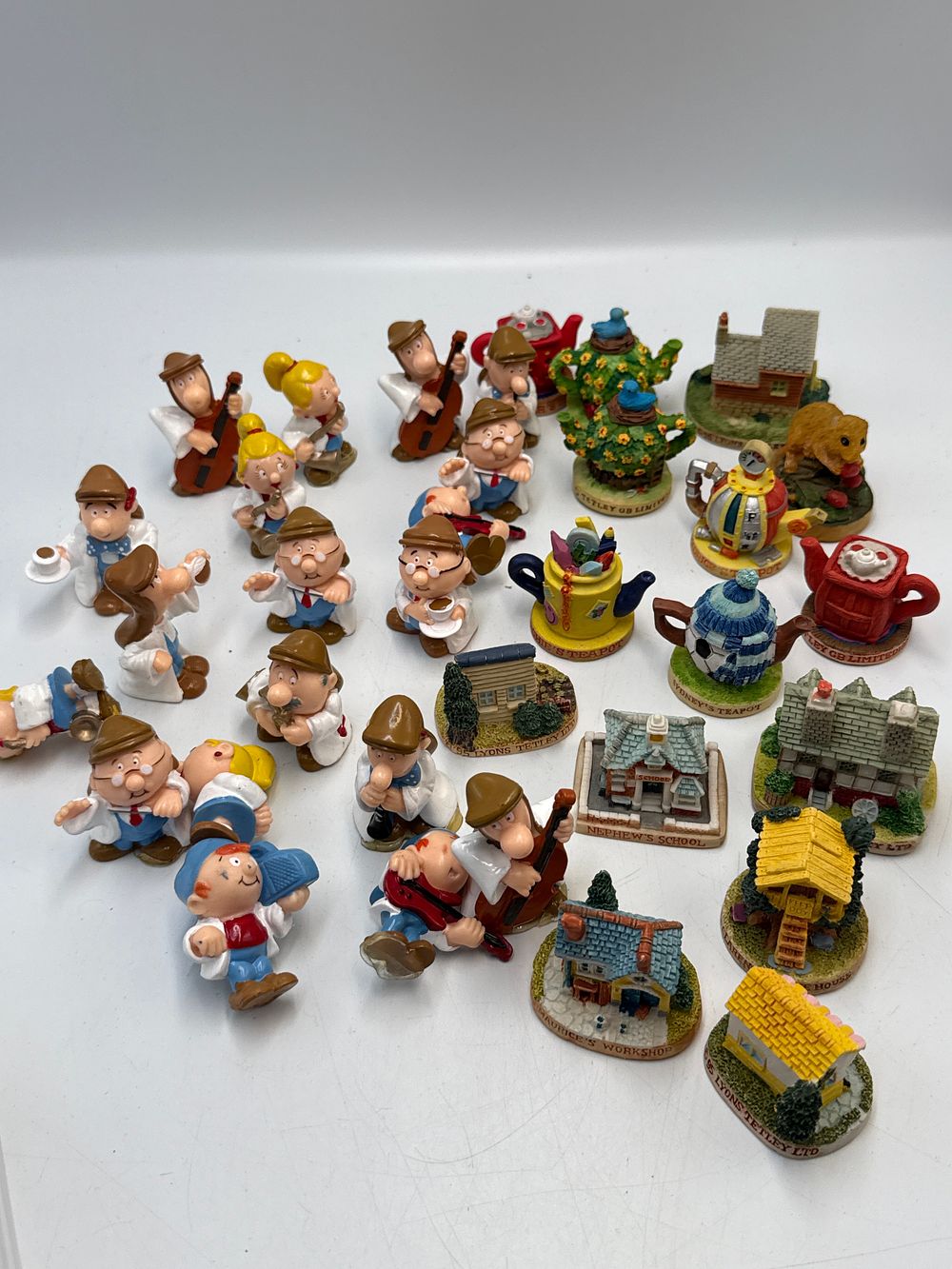 Lot 812: Lyons Tetley Ltd? Cast Resin Tetley Tea Folk Collection, 1995