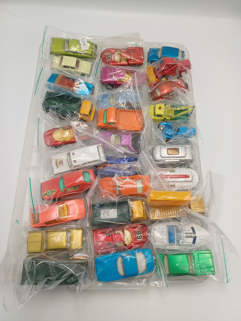 Lot 875: A Collection of Thirty Die-Cast Metal and Plastic Matchbox? Toy Vehicles