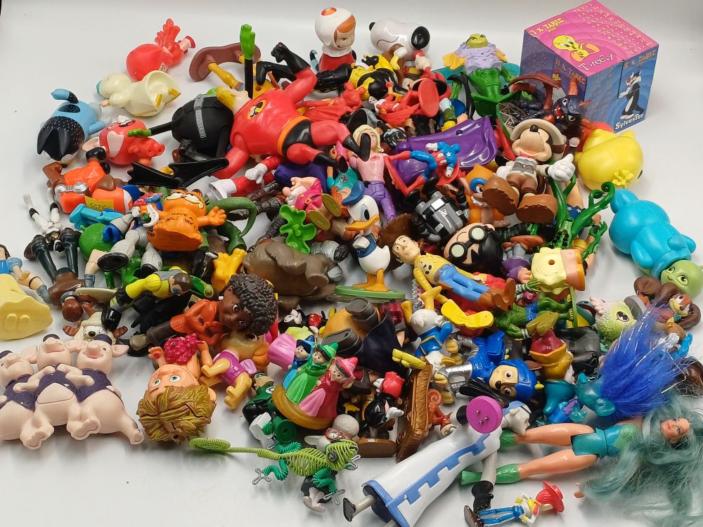 Lot 879: A Collection of Disney and Character Plastic Toy Figures