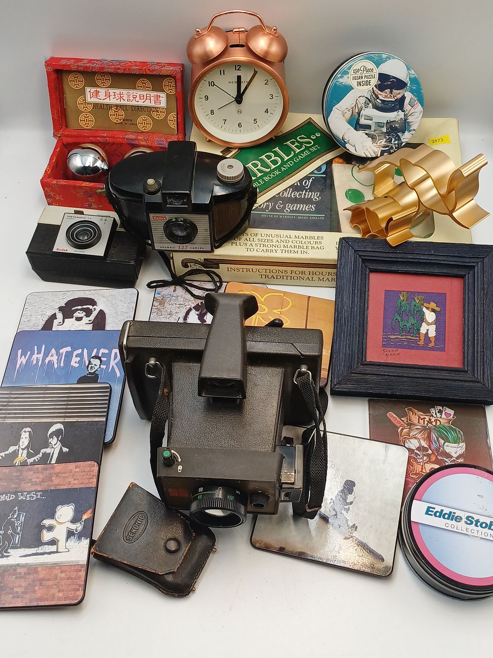 Lot 882: A Collection of Vintage Kodak and Polaroid Land Cameras with Assorted Collectibles