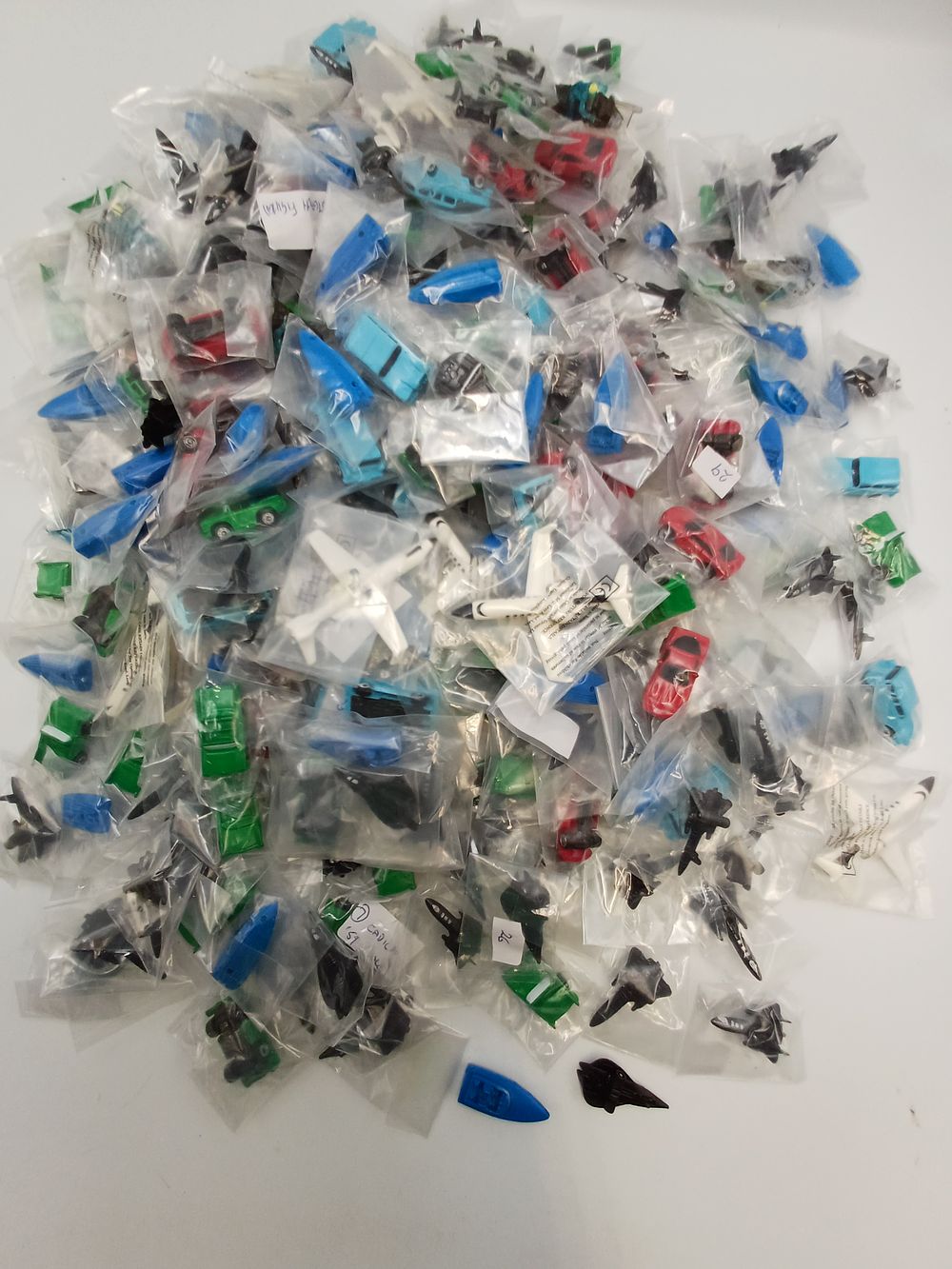 Lot 892: A Collection of Plastic Miniature Vehicles, Aircraft, and Vessels, Toy Options Ltd?