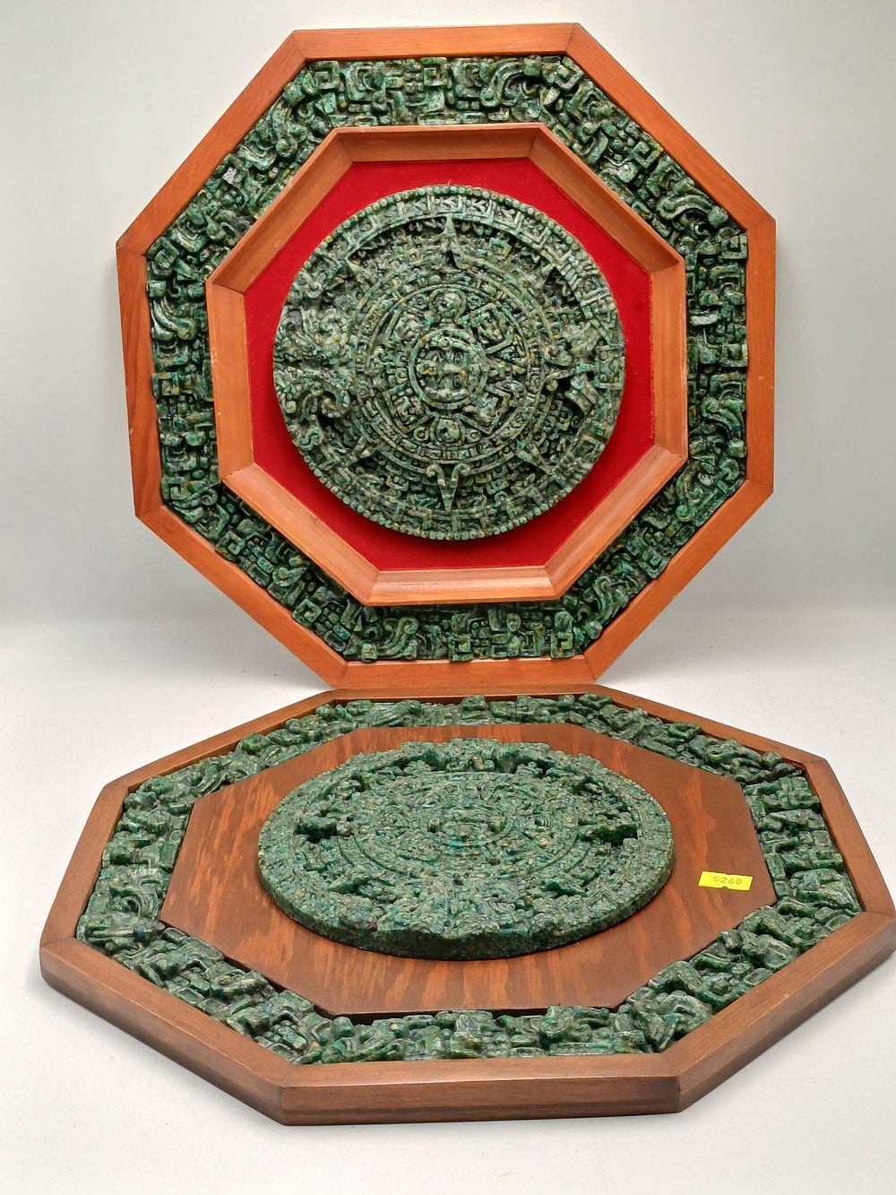 Lot 944: A Pair of Mexican? Resin Plaques in Aztec Sun Stone Style, 35cm