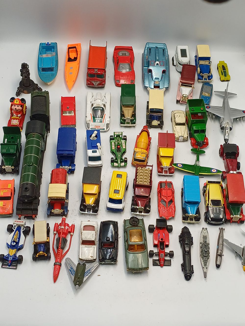 Lot 949: A Collection of Die-Cast and Plastic Toy Vehicles, Aircraft, and Vessels